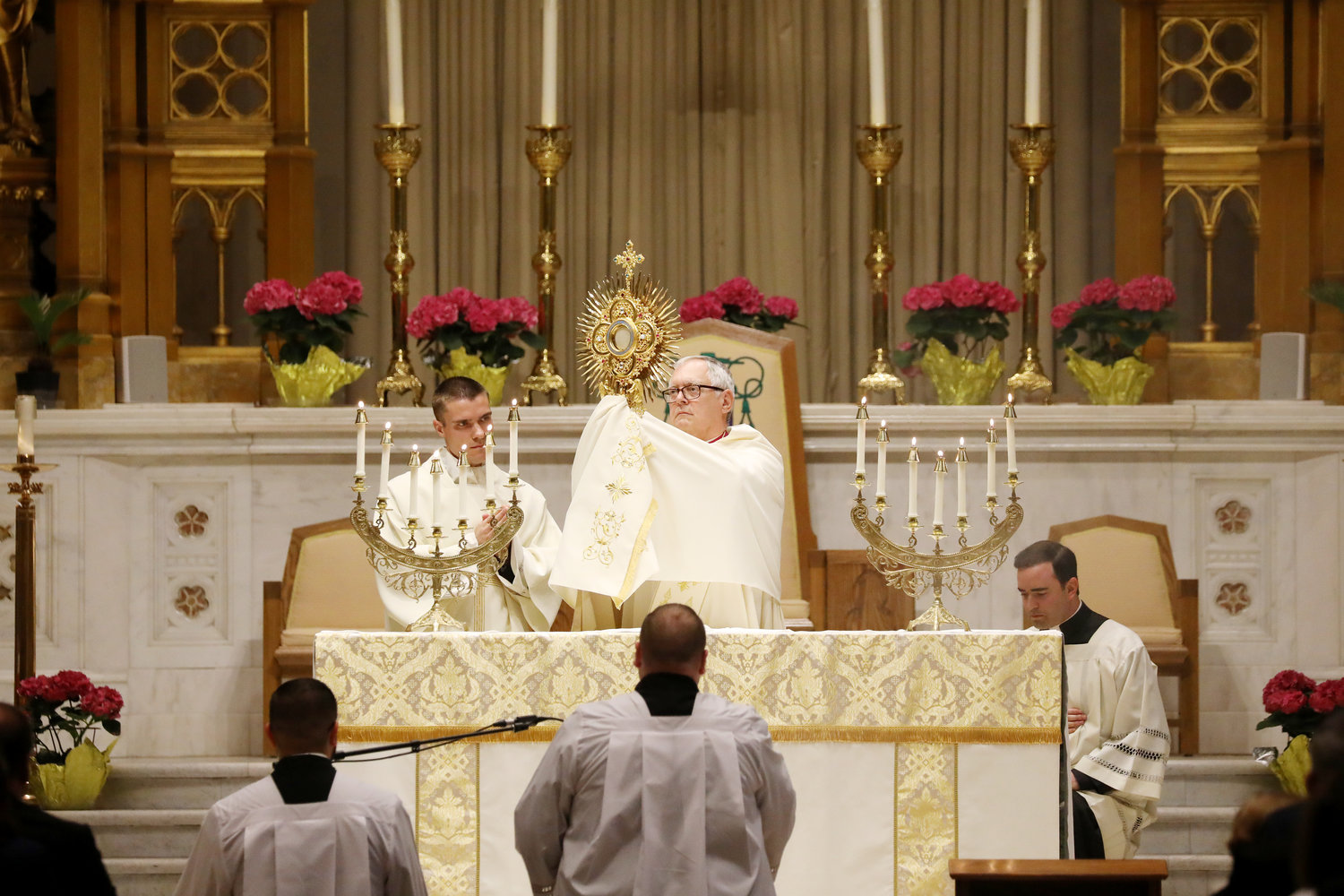 Bishop Thomas J. Tobin led the faithful in prayer before the Blessed Sacrament prior to Cardinal Dolan’s presentation.